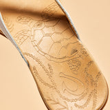 OluKai Womens Honu Leather Sandals - Bright White / Golden Sand